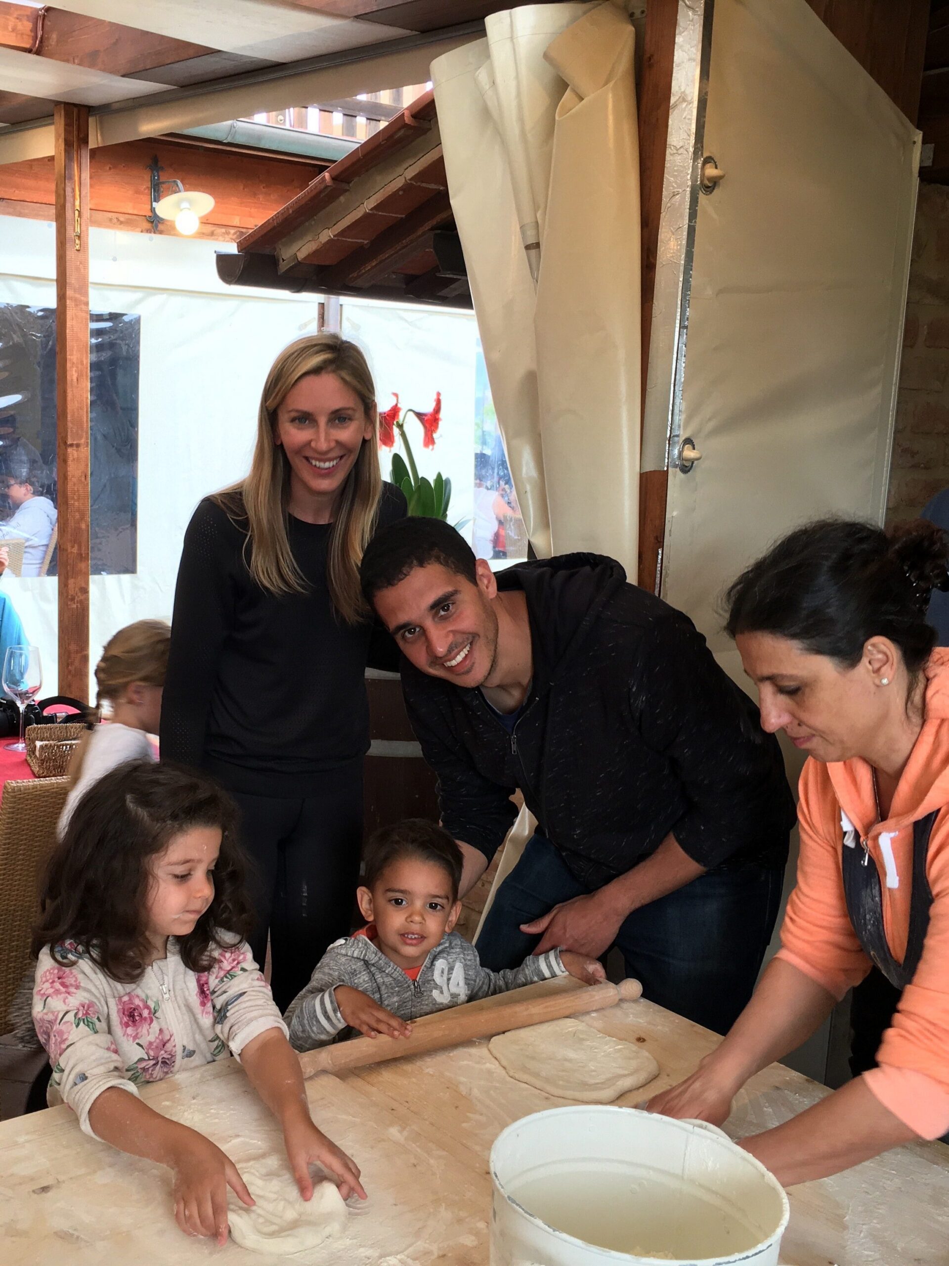 Darrell cooking with a family